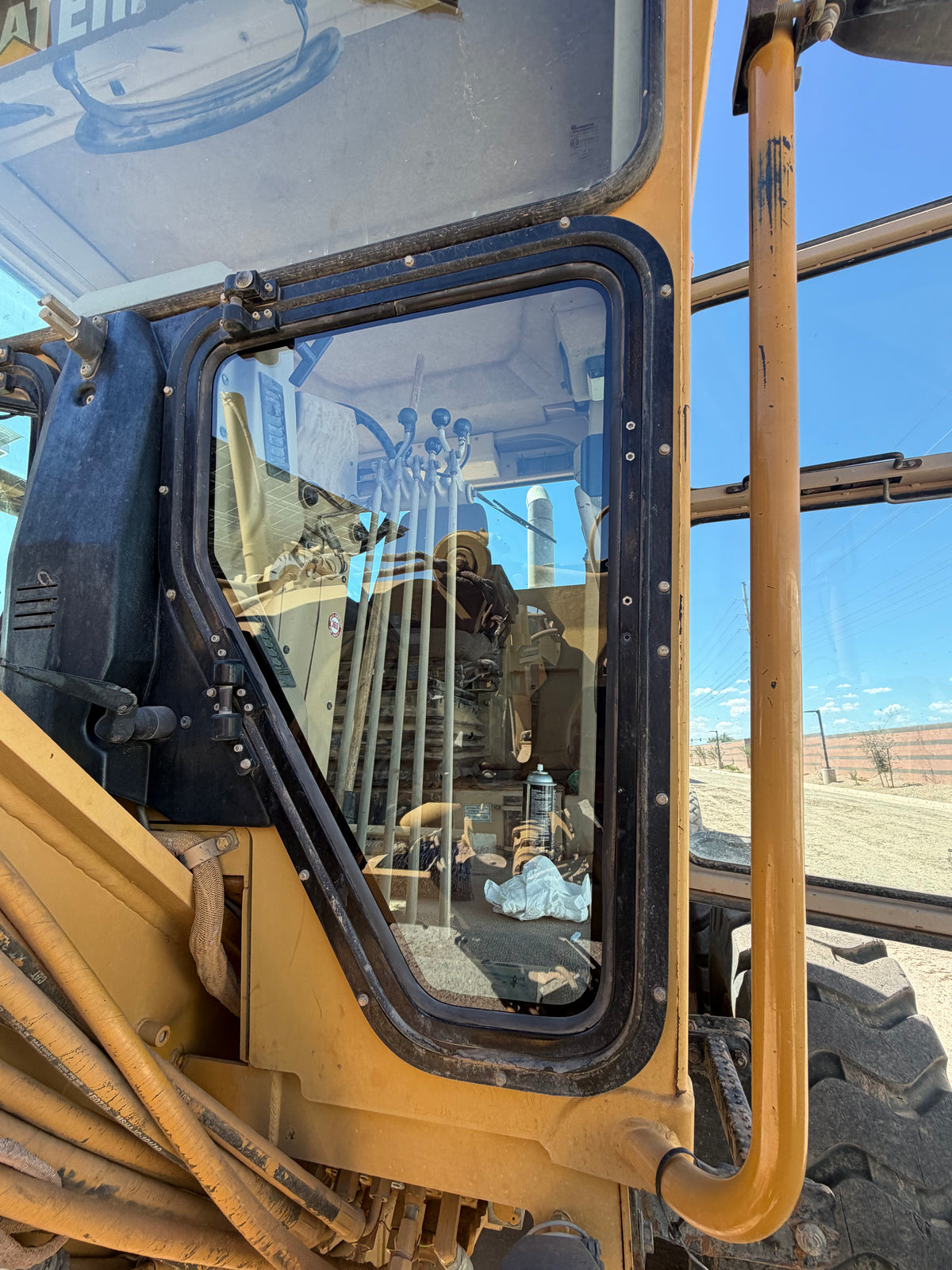 CAT 140H Lower Kick Window Glass – Left or Right – Green Laminated Custom Cut